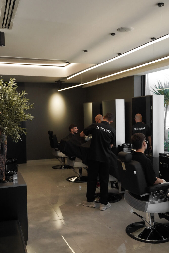 Interior of intense barbershop in Amman