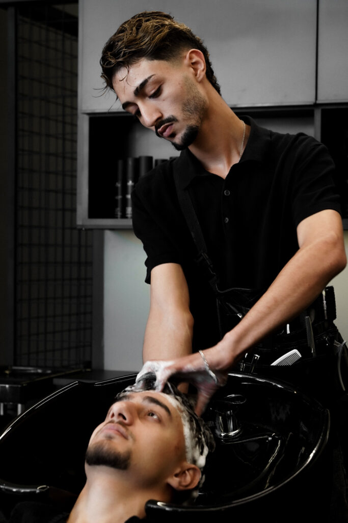 Expert grooming services and hair styling for men at Intense Grooming's Fourth Circle branch in Amman.