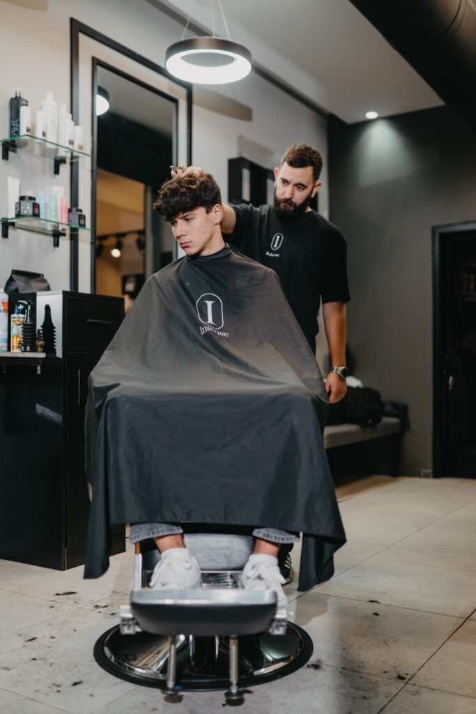 Expert grooming services and hair styling for men at Intense Grooming's Fourth Circle branch in Amman.